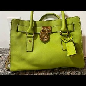 Green Michael kors hand bag . Perfect condition